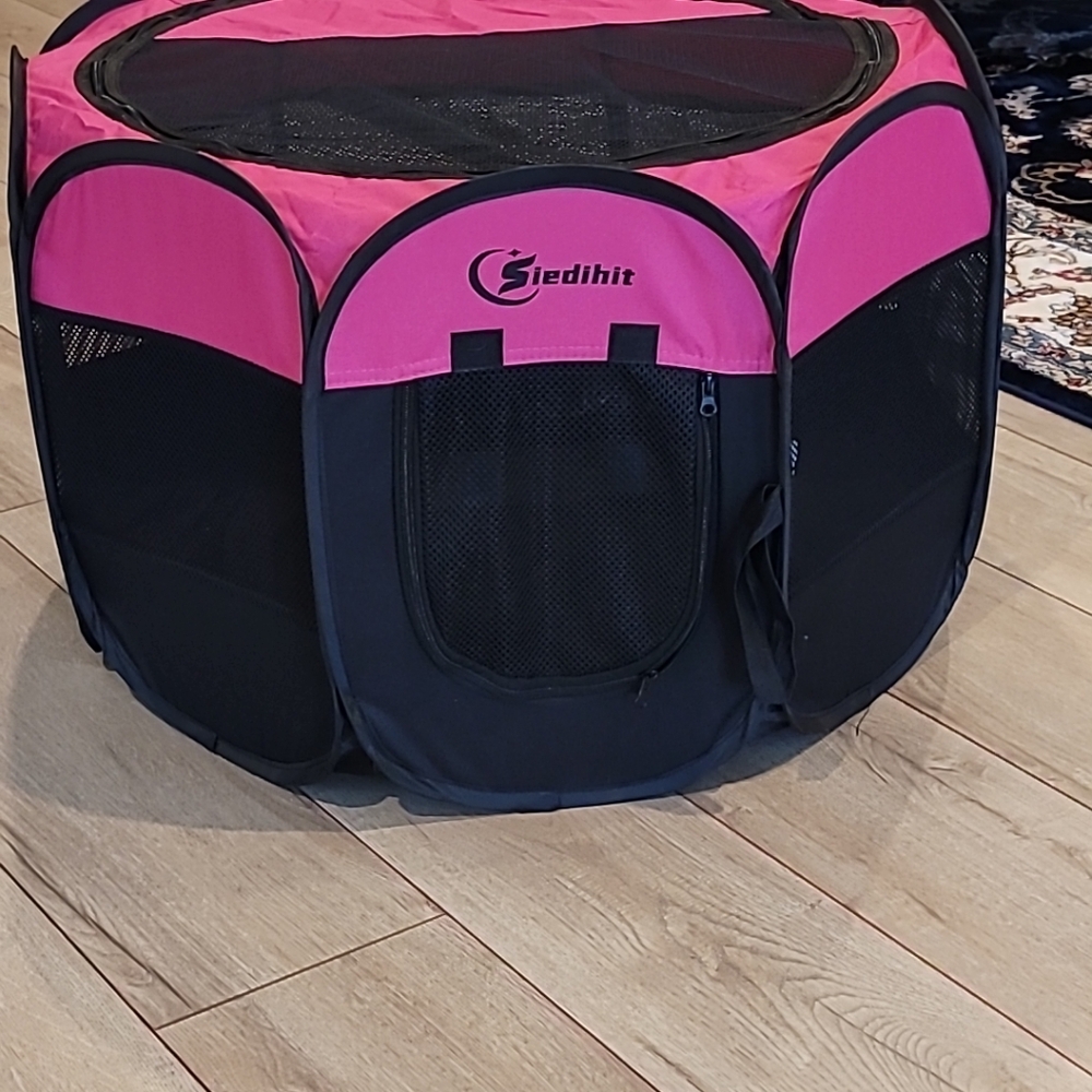 Animal screened in playpen